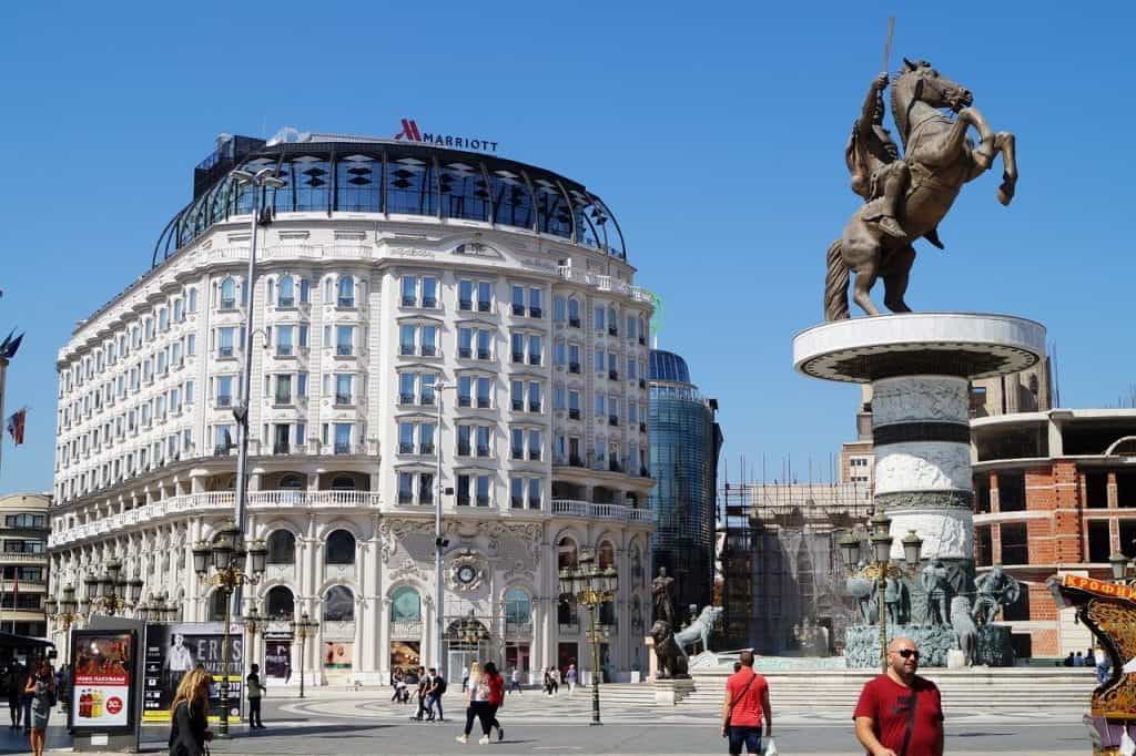 The Marriott hotel in Skopje with a statue of Alexander the Great in front.