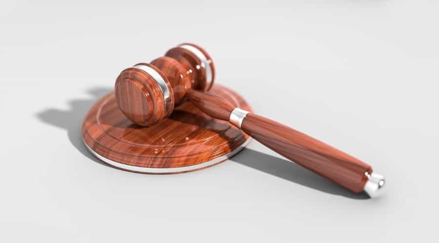 A gavel, as would be used in a courthouse.