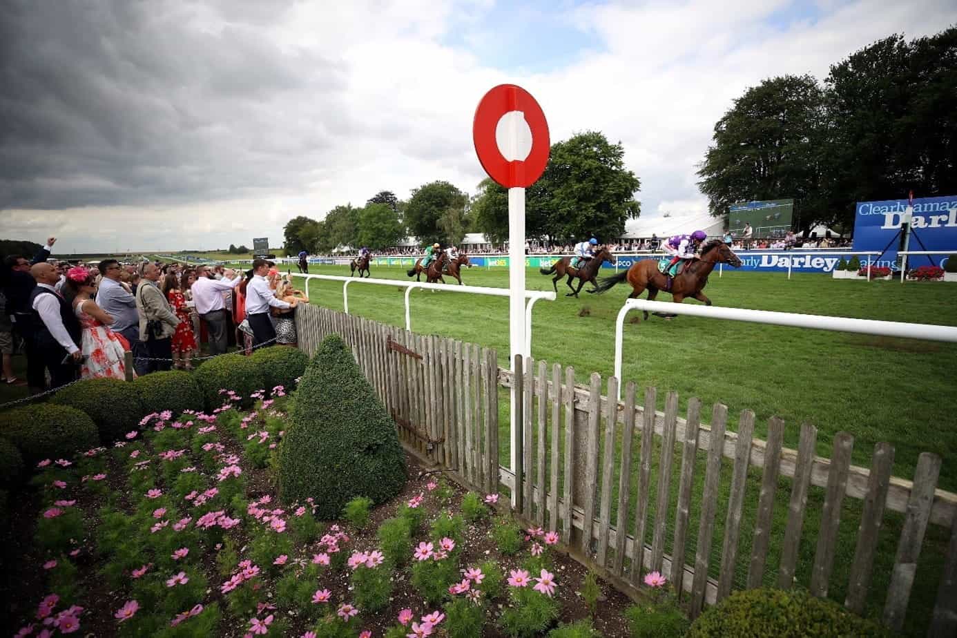 Spectators watching a horse race.
