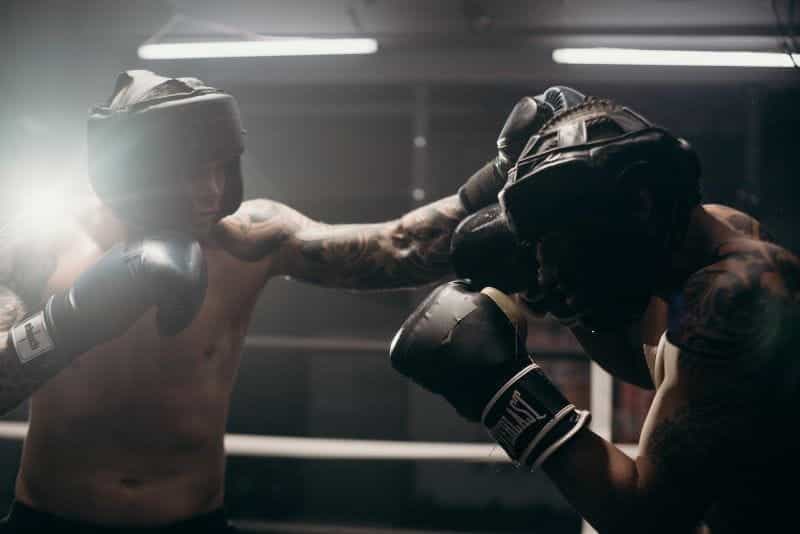 Two boxers fighting in the ring.