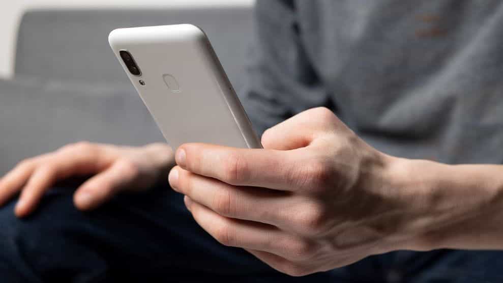Mobile phone gaming man.
