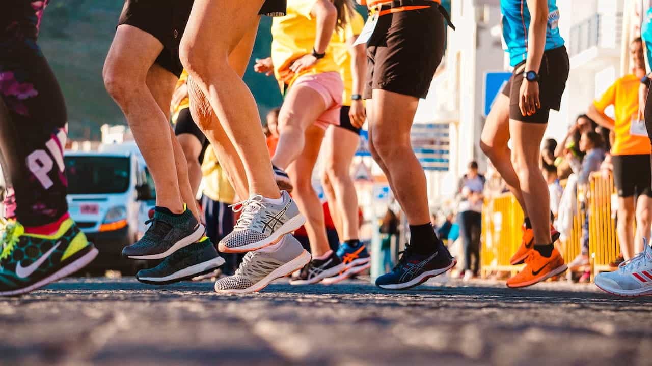 A group of runners preparing for a race.