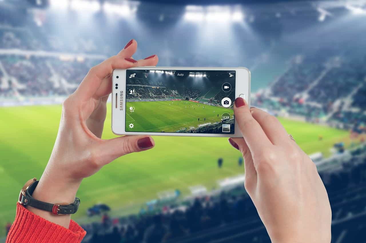 Woman holding a mobile phone.